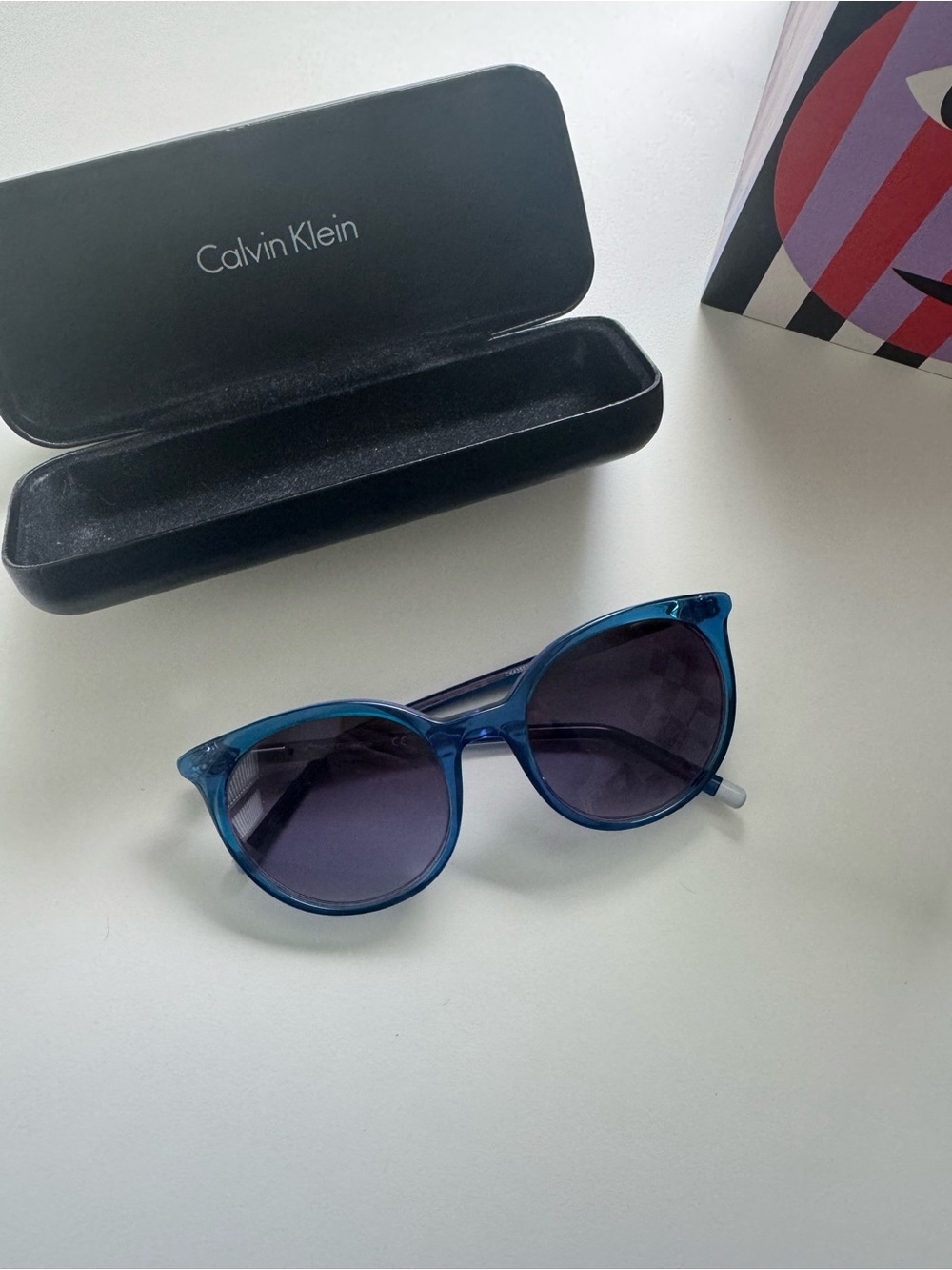Calvin Klein Teal Blue Rounded Cat-Eye Sunglasses